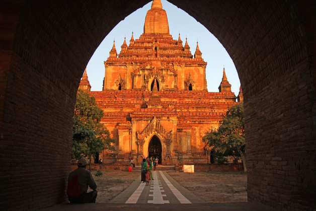 Myanmar pagoda view thorugh archway at sunset