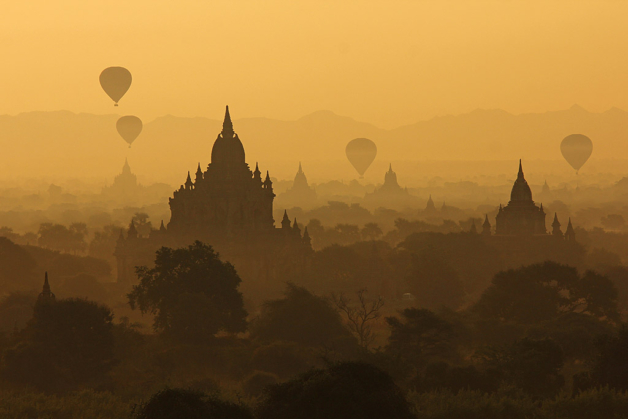 Myanmar balloons over Bagan pagodas at sunrise