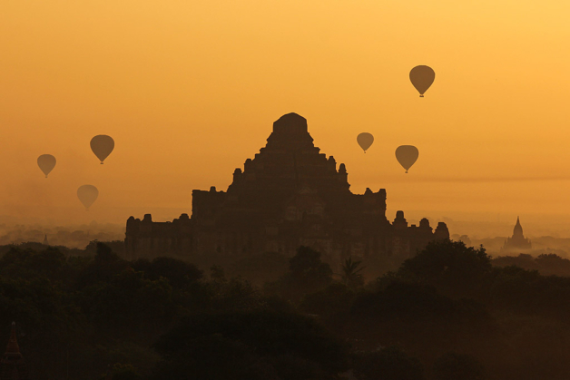 Myanmar balloons over Bagan pagodas at sunrise Dhammayangyi