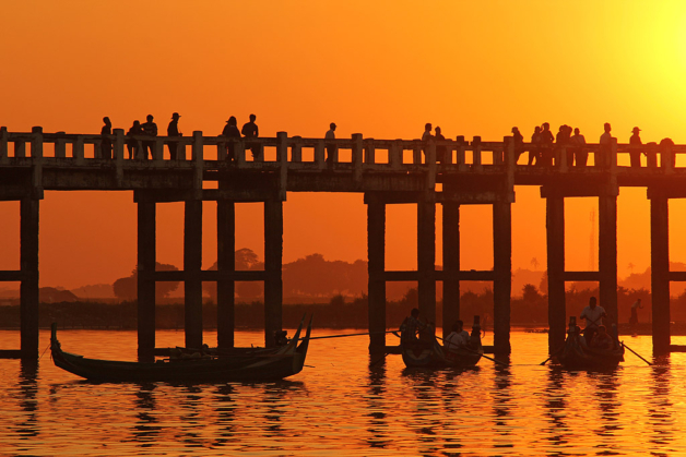 Myanmar Mandalay U Bein Bridge boats at sunset