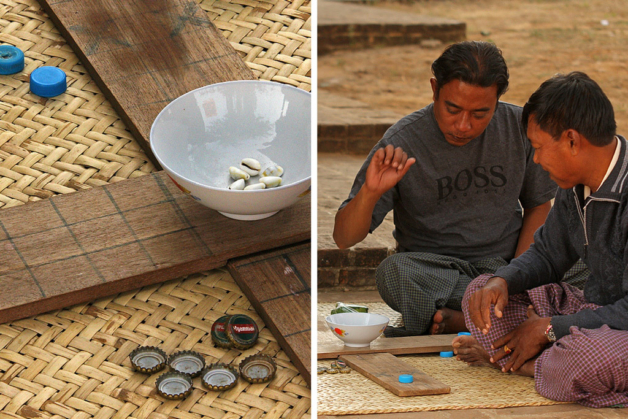 Myanmar locals play game with shells and bottle caps